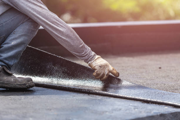 Professional Basement Waterproofing technician working in Templeton, IN